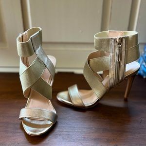 Gold Nine West heels.
